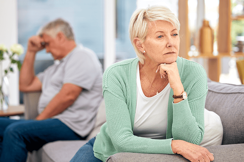 mature couple thinking about how to cope of with divorce on mid 60s